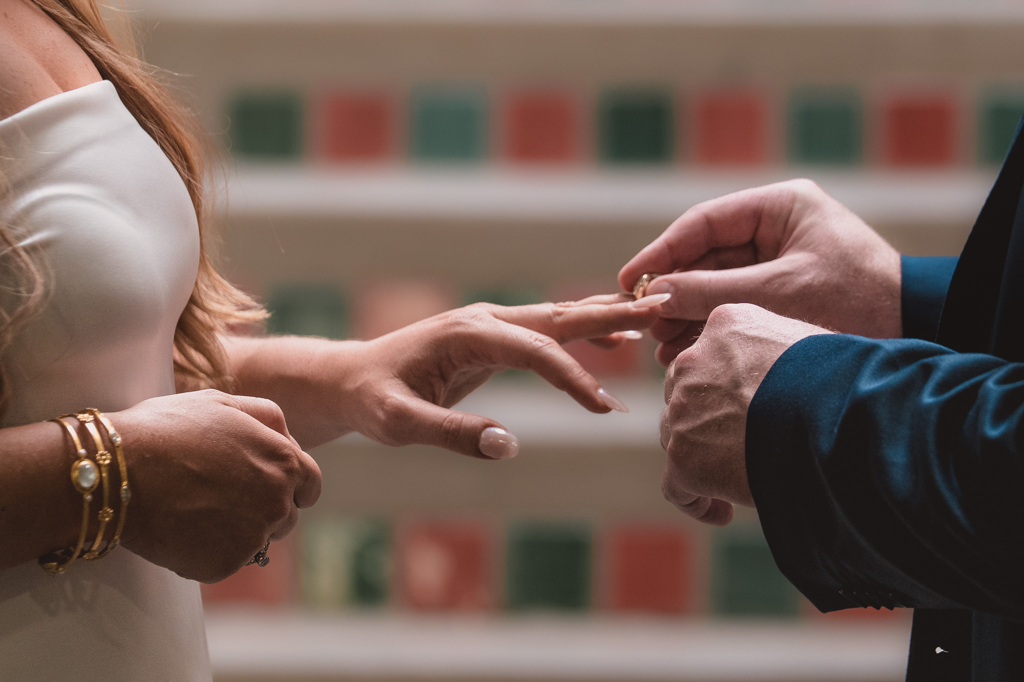 Denver courthouse elopement photographer — close-up of ring exchange during an intimate courthouse ceremony