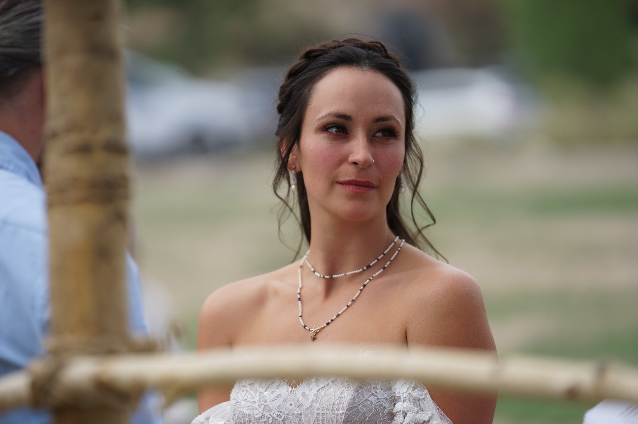 Red Rocks elopement photographer — emotional bride during an outdoor Colorado elopement ceremony